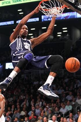 Oklahoma City Thunder forward Kevin Durant (35) makes a basket against the Brooklyn Nets in the second quarter at the Barclays Center in New York City on December 4, 2012.  NYP20121204501