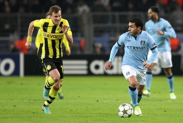 04.12.2012, Dortmund, Fussball, Champions League, Gruppe D, 6. Spieltag, Borussia Dortmund - Manchester City FC. v.l. Kevin Großkreutz (Dortmund), Carlos Tevez (Manchester)