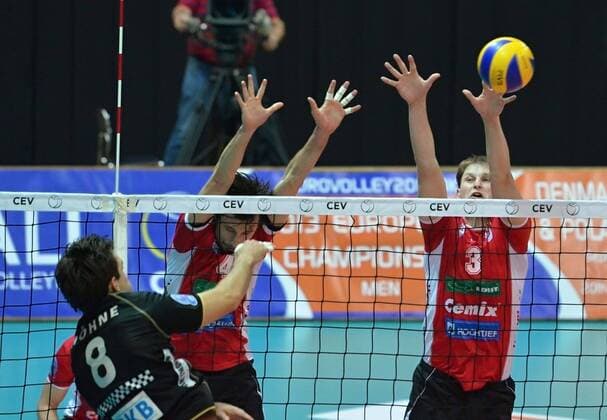 Champions League, group B, voleyball, Jihostroj Ceske Budejovice - Berlin Recycling Volleys, December 12, 2012, Ceske Budejovice, Czech Republic. Jakub Novotny (center) and Radek Mach (right) of Nymburk and Bjorn Hohne (left) of Berlin. (CTKxPhoto DavidxVeis) CTKPhotoP201212120987301  VEI 5