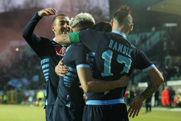 Edinson Cavani (Napoli) with teammates Omar El Kaddouri, Marek Hamsik and Valon Behrami (Napoli) - Siena, 22.12.2012 - Serie A 2012 2013 - AC Siena vs SSC Napoli -. lucaxpagliaricci