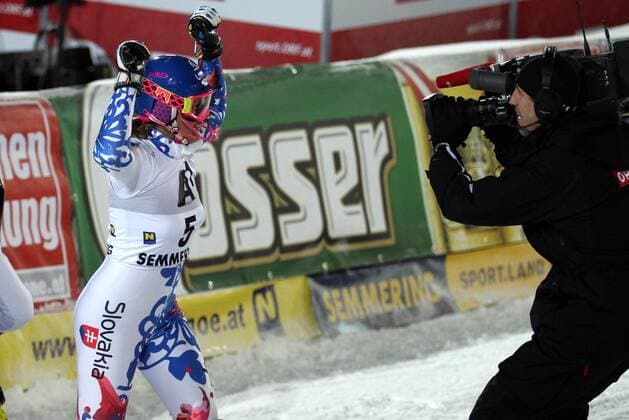 SKI ALPIN - FIS WC Semmering, Slalom, Damen SEMMERING,AUSTRIA,29.DEZ.12 - SKI ALPIN - FIS Weltcup, Slalom der Damen, Nachtslalom. Bild zeigt den Jubel von Veronika Velez Zuzulova (SVK) und einen Kameramann. 