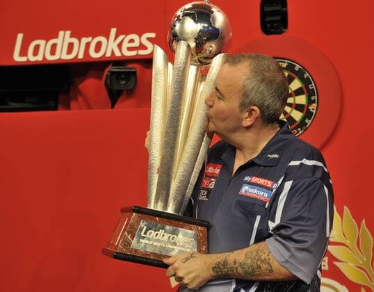 01.01.2013 London, England. Phil Taylor ENG becomes the 2013 Champion. Taking the 3;200,000 Pounds first prize and first player to lift the Sid Waddell Trophy. The Ladbrokes World Darts Championships from Alexandra Palace xStephenxBartholomewx  ActionPlus11147
