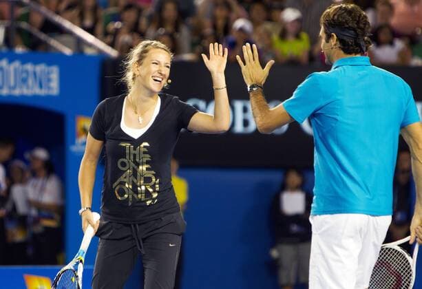 TENNIS - Australian Open 2012 MELBOURNE,AUSTRALIEN,12.JAN.13 - TENNIS - Grand Slam, Australian Open, Kids Tennis Day. Bild zeigt Victoria Azarenka (BLR) und Roger Federer (SUI). 