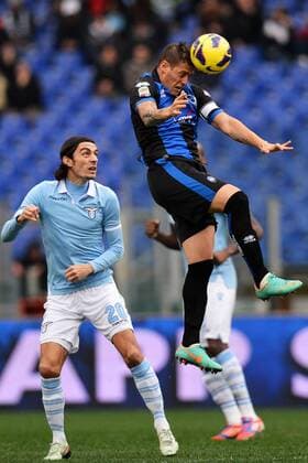 German Denis Atalanta (R), Giuseppe Biava Lazio (L).Roma - Rom, 13.01.2013 - Serie A 2012 2013 - Lazio Rom vs Atalanta Bergamo - andreaxstaccioli