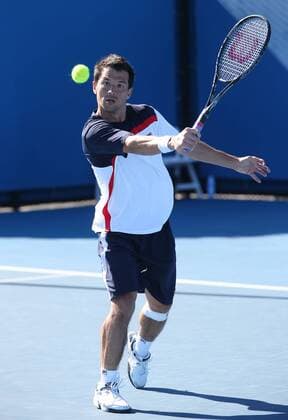 Australian Open 2013, Melbourne Park,ITF Grand Slam Tennis Tournament, Björn Phau (GER),Aktion,Einzelbild,Ganzkoerper,Hochformat,