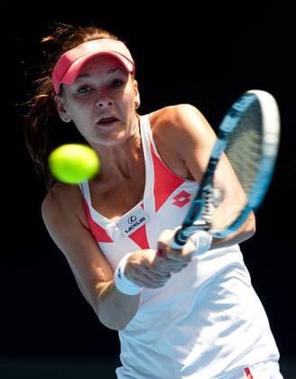 (130116) -- MELBOURNE, Jan. 16, 2013 (Xinhua) -- Agnieszka Radwanska of Poland hits a return during her second round women s singles match on the third day of 2013 Australian Open tennis tournament in Melbourne, Australia, Jan. 16, 2013. AUSTRALIA-MELBOURNE-TENNIS-WOMEN S SINGLES 