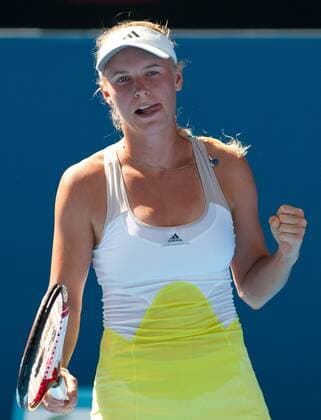 (130117) -- MELBOURNE, Jan. 17, 2013 (Xinhua) -- Caroline Wozniacki of Denmark celebrates after scoring during her second round women s singles match on the fourth day of 2013 Australian Open tennis tournament in Melbourne, Australia, Jan. 17, 2013. . (Xinhua Bai Xue) AUSTRALIA-MELBOURNE-TENNIS-WOMEN S SINGLES 