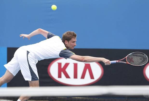 Australian Open 2013, Melbourne Park,ITF Grand Slam Tennis Tournament, Florian Mayer (GER),Aktion,Einzelbild,Halbkoerper,Querformat,