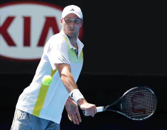 Australian Open 2013, Melbourne Park,ITF Grand Slam Tennis Tournament, Daniel Brands (GER),Aktion,Einzelbild,Halbkoerper,Querformat,
