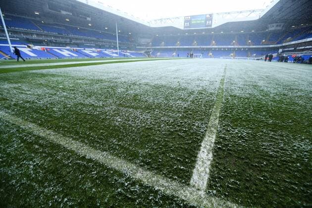 Football - 2012 2013 Premier League - Tottenham Hotspur vs. Manchester United ManU The lines are difficult to see because of the snow at White Hart Lane, London 