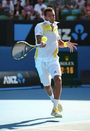 Australian Open 2013, Melbourne Park,ITF Grand Slam Tennis Tournament,Jo-Wilfried Tsonga (FRA), Aktion,Einzelbild,Ganzkoerper,Hochformat,