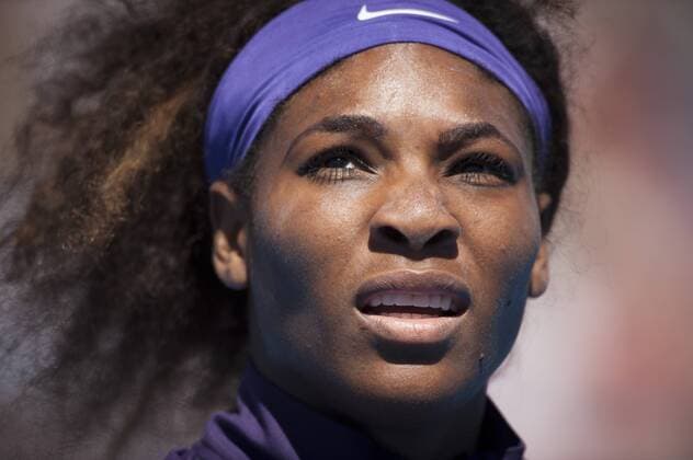 Jan. 22, 2013 - Serena Williams (USA) (purple shirt) in 2013 Womens Doubles play at Margaret Court Arena in Melbourne. Williams Sisters Upset in Australian Open - ZUMAkh1