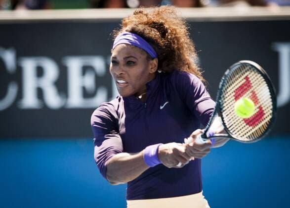 Jan. 22, 2013 - Serena Williams (USA) (purple shirt) in 2013 Womens Doubles play at Margaret Court Arena in Melbourne. Williams Sisters Upset in Australian Open - ZUMAkh1