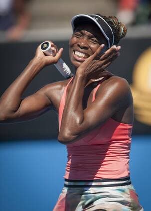 Jan. 22, 2013 - Venus Williams (USA) (pink shirt) in 2013 Womens Doubles play at Margaret Court Arena in Melbourne. Williams Sisters Upset in Australian Open - ZUMAkh1