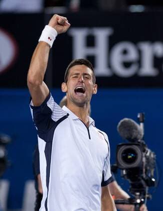 (130122) -- MELBOURNE, Jan. 22, 2013 (Xinhua) -- Novak Djokovic of Serbia reacts after winning his men s singles quarterfinals match against Tomas Berdych of Czech Republic at 2013 Australian Open tennis tournament in Melbourne, Australia, Jan. 22, 2013. Novak Djokovic won 3-1. (Xinhua Bai Xue) AUSTRALIA-MELBOURNE-TENNIS-MEN S SINGLES 