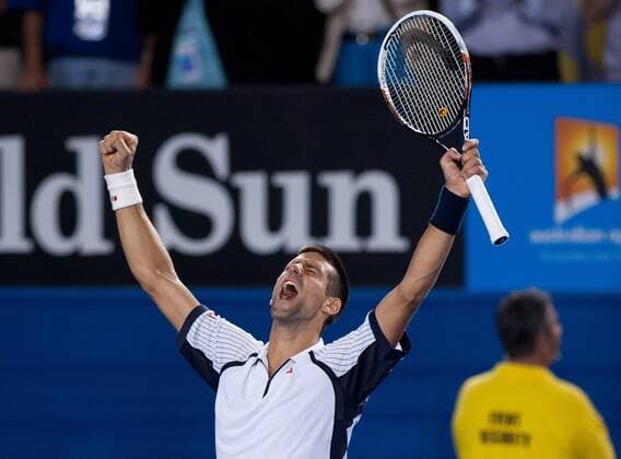 (130122) -- MELBOURNE, Jan. 22, 2013 (Xinhua) -- Novak Djokovic of Serbia reacts after winning his men s singles quarterfinals match against Tomas Berdych of Czech Republic at 2013 Australian Open tennis tournament in Melbourne, Australia, Jan. 22, 2013. Novak Djokovic won 3-1. (Xinhua Bai Xue) AUSTRALIA-MELBOURNE-TENNIS-MEN S SINGLES 