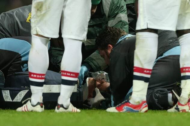 Football - 2012 2013 Premier League - Arsenal vs. West Ham United West Ham s Dan Potts is badly injured and has an oxygen mask and neck brace fitted at the Emirates Stadium, London 