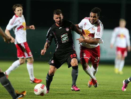 FUSSBALL - RBS vs Kaiserslautern, Testspiel BELEK,TÜRKEI,25.JAN.13 - FUSSBALL - tipp3 Bundesliga powered by T-Mobile, 2. Deutsche Bundesliga, Red Bull Salzburg vs 1. FC Kaiserslautern, Trainingslager, Vorbereitungsspiel. Bild zeigt Benjamin Koehler (Kaiserslautern) und Valentino Lazaro (RBS). 
