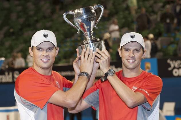 Jan. 26, 2013 - Melbourne, Victoria, Australia - BOB BRYAN (USA) and brother MIKE BRYAN (USA) with the championship trophy after their men s doubles victory in the finals of the 2013 Australian Open. The Grand Slam tournament is being held at Melbournes Rod Laver Arena. Tennis 2013 - Australian Open - Bryan Bros Win Men s Doubles - ZUMAkh1