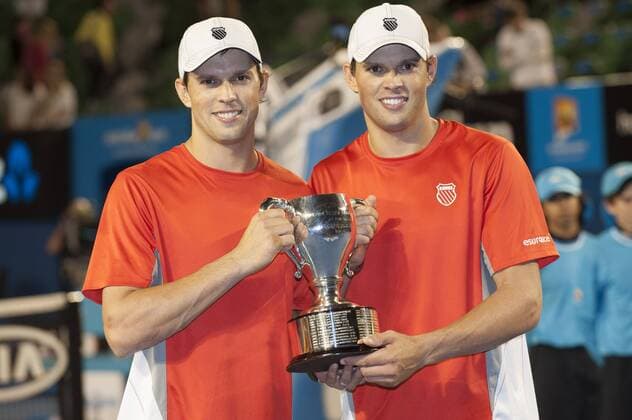 Jan. 26, 2013 - Melbourne, Victoria, Australia - BOB BRYAN (USA) and brother MIKE BRYAN (USA) with the championship trophy after their men s doubles victory in the finals of the 2013 Australian Open. The Grand Slam tournament is being held at Melbournes Rod Laver Arena. 2013 Tennis - Australian Open Day 13 - ZUMAkh1