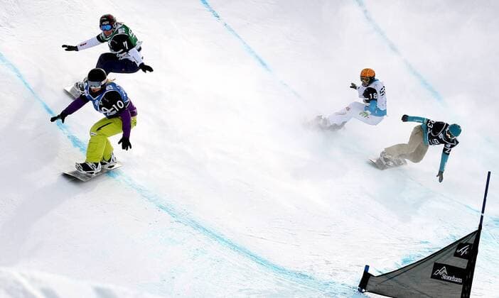 SNOWBOARD - FIS WM Stoneham, SBX, Damen STONEHAM,KANADA,26.JAN.13 - SNOWBOARD - FIS Weltmeisterschaften Stoneham, Boarder Cross, Snowboardcross, Damen. Bild zeigt Sandra Gerber (SUI), Deborah Anthonioz (FRA), Susanne Moll (AUT) und Bell Berghuis (NED). 