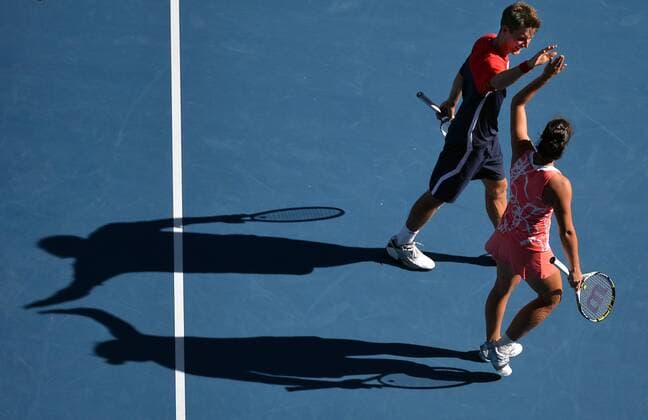 (130127) -- MELBOURNE, Jan. 27, 2013 (Xinhua) -- Jarmila Gajdosova (Bottom) and Matthew Ebden of Australia celebrate their victory after their mixed doubles final match at the 2013 Australian Open tennis tournament in Melbourne, Australia, Jan. 27, 2013. 