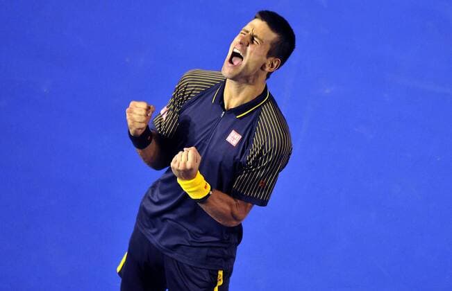 (130127) -- MELBOURNE, Jan. 27, 2013 -- Novak Djokovic of Serbia celebrates for victory after winning the men s singles final at the 2013 Australian Open tennis tournament in Melbourne, Australia, Jan. 27, 2013. Novak Djokovic won 3-1 to claim the champion. AUSTRALIA-MELBOURNE-TENNIS-MEN S SINGLES-FINAL 
