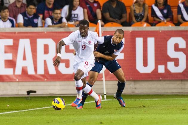 29 JANUARY, 2013: Canadian National Soccer F Tosaint Ricketts (9) and U.S. National Soccer D Justin Morrow (2) fighting for the ball during a friendly match at BBVA Compass Stadium in Houston, TX. SOCCER: JAN 29 International Friendly - Canada at USA Icon20130129007 EDITORIAL USE ONLY