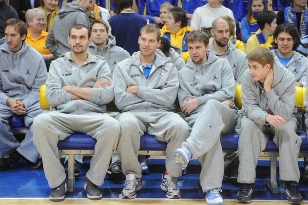 ITAR-TASS: MOSCOW REGION, RUSSIA. JANUARY 26, 2013. Players of basketball club Khimki Moscow Region Alexei Zhukanenko, Sergei Monya, Egor Vyaltsev (L-R) and Kresimir Loncar, James Augastine, Petteri Koponen (R-L, background) seen during the meeting with acting Moscow Region governor Andrei Vorobyev (not in pic).  RE112861