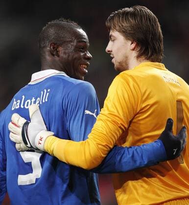 Tim Krul and Mario Balotelli during the match 