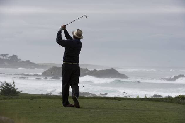 Actor Andy Garcia tees off on the 11th hole at the Monterey Peninsula Country Club in the AT&T National Pro Am in Pebble Beach, California on February 7, 2013.  SXP20130200709