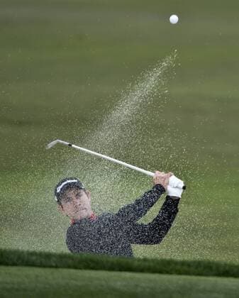 Camilo Villegas of Columbia hits out of the sand to the sixth green at the Monterey Peninsula Country Club in the AT&T National Pro Am in Pebble Beach, California on February 7, 2013.  SXP20130200712