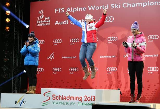 SKI ALPIN - FIS Ski WM 2013, Abfahrt, Damen SCHLADMING,AUSTRIA,10.FEB.13 - SKI ALPIN - FIS Alpine Ski Weltmeisterschaften 2013, Abfahrt der Damen, Siegerehrung, Medaillenvergabe, Medal Plaza. Bild zeigt Nadia Fanchini (ITA), Marion Rolland (FRA) und Maria Höfl Riesch (GER). 