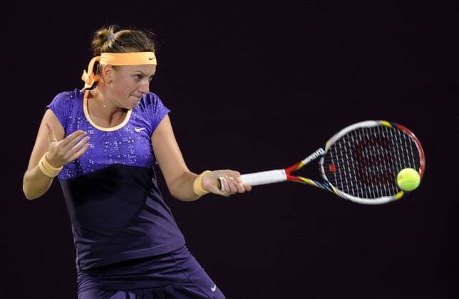 DOHA, Feb. 14, 2013 -- Petra Kvitova of the Czech Republic hits a return during the women s singels third round match at the WTA Tennis Damen Qatar Open tennis tournament in Doha, Qatar, Feb. 14, 2013. 