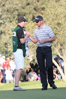 Feb. 17, 2013 - Pacific Palisades, California, U.S. - 02 17 13 Pacific Palisades, CA: John Merrick and caddie Ryan Goble celebrate after winning the Northern Trust open on the second playoff hole. t February 17, 2013 Northern Trust Open Final Round - ZUMAec2