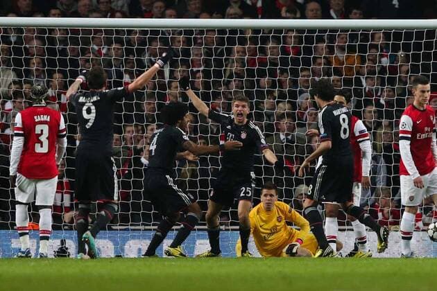Football - 2012 2013 Champions League - Round of 16, First Leg: Arsenal vs. Bayern Munich Bayern Munich s Thomas Müller celebrates scoring at the Emirates Stadium, London 