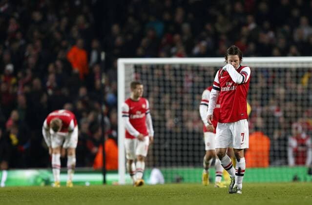 Arsenal s Tomas Rosicky looks on dejected after going 3-1 down..Arsenal v Bayern Munich - Champions League Second Round, First Leg- Emirates Stadium, London- 19 02 13 - Picture David Klein Sportimage EDITORIAL USE ONLY. No use with unauthorised audio, video, data, fixture lists, club league logos or live services. Online in-match use limited to 120 images, no video emulation. No use in betting, games or single club league player publications.