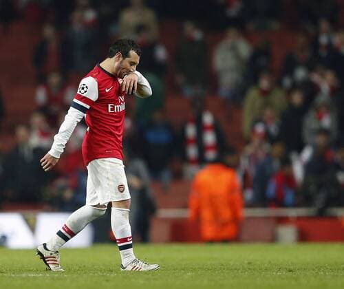 Arsenal s Santi Cazorla looks on dejected at the final whistle..Arsenal v Bayern Munich - Champions League Second Round, First Leg- Emirates Stadium, London- 19 02 13 - Picture David Klein Sportimage EDITORIAL USE ONLY. No use with unauthorised audio, video, data, fixture lists, club league logos or live services. Online in-match use limited to 120 images, no video emulation. No use in betting, games or single club league player publications.