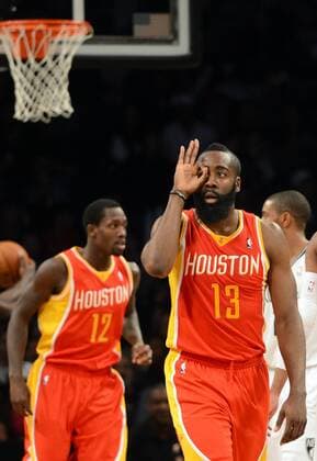 James Harden(R) of Houston Rockets celebrates during the NBA Basketball Herren USA game against Brooklyn Nets in New York, the United States, Feb. 22, 2013. Rockets won 106-96.(Xinhua Wang Lei)(ql) US-NEW YORK-NBA-ROCKETS VS NETS 