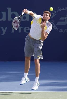 Dubai Tennis Championships 2013, ATP Tennis Herren Tennis Turnier,International Series,Dubai Tennis Stadium, U.A.E.,Daniel Brands (GER),Aktion,Einzelbild,Ganzkoerper,Hochformat,