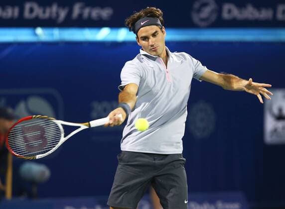 Dubai Tennis Championships 2013, ATP Tennis Herren Tennis Turnier,International Series,Dubai Tennis Stadium, U.A.E.,Roger Federer (SUI),Aktion,Einzelbild, Halbkoerper,Querformat,