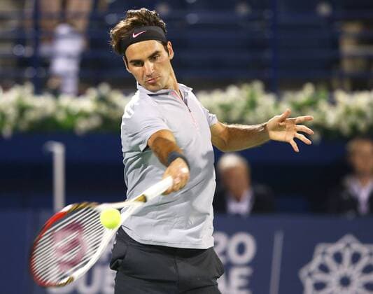 Dubai Tennis Championships 2013, ATP Tennis Herren Tennis Turnier,International Series,Dubai Tennis Stadium, U.A.E.,Roger Federer (SUI),Aktion,Einzelbild, Halbkoerper,Querformat,