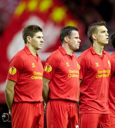 PROPAGANDA20130221 Football - soccer: UEFA Europa League, Liverpool FC - FC Zenit St Petersburg, Liverpool s captain Steven Gerrard, Jamie Carragher and Daniel Agger line up before the UEFA Europa League Round of 32 match against FC Zenit St Petersburg at Anfield. (Hinweis: Verwendung nur in Deutschland, Österreich oder Schweiz - only Germany, Austria and Switzerland) xHOCHxZWEIx xPropagandax 