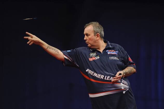 Exeter, England. Phil Taylor in action in his match during Round Four of the McCoy s Premier League Darts at Westpoint Arena. xRoganxThomsonx  ActionPlus146127