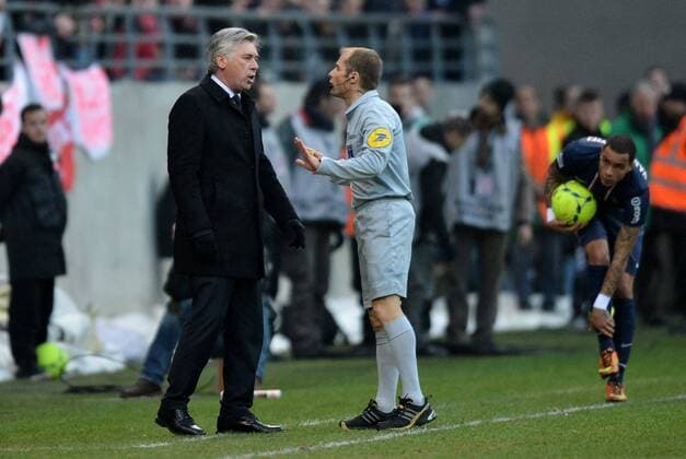 Carlo Ancelotti (psg) - Philippe Kalt (arbitre) FOOTBALL : Reims vs Paris SG - Ligue 1 - 02 03 2013 AnthonyBIBARD FEP Panoramic 