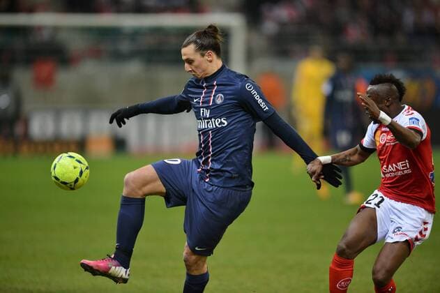Zlatan Ibrahimovic (psg) - Bocundji Ca (rei) FOOTBALL : Reims vs Paris SG - Ligue 1 - 02 03 2013 AnthonyBIBARD FEP Panoramic 