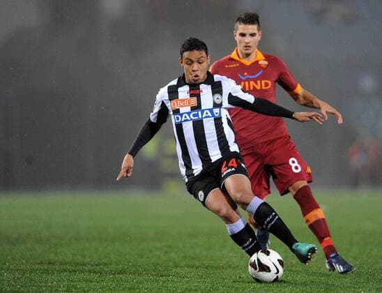 IPP20130309 Football - soccer: Serie A, Udinese Calcio - AS Rom, Fruto Luis Fernando Muriel vs Erik Lamela. - xHOCHxZWEIx xItalyxPhotoxPressx 