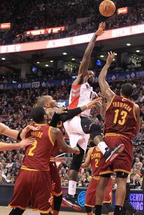 TORONTO, March 10, 2013 - Amir Johnson(Top) of Toronto Raptors goes to the basket during the NBA Basketball Herren USA game against Cleveland Cavaliers at Air Canada Centre in Toronto, Canada, March 10, 2013. Raptors won 100-96. (Xinhua Zou Zheng)(ql) CANADA-TORONTO-NBA-CAVALIERS VS.RAPTORS 