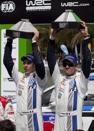 Volkswagen Motors French driver Sebastien Ogier (R) and co-driver Julien Ingrassia pose with their trophies after winning the first place of the World Rally Championship WRC Motorsport Rallye WM third stage in Leon, Guanajuato State, Mexico, on March 10, 2013. (Xinhua Jose Medrano) (mp) MEXICO-LEON-WRC 