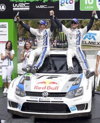 Volkswagen Motors French driver Sebastien Ogier (R) and co-driver Julien Ingrassia celebrate winning the first place of the World Rally Championship WRC Motorsport Rallye WM third stage in Leon, Guanajuato State, Mexico, on March 10, 2013. (Xinhua Jose Medrano) (mp) MEXICO-LEON-WRC 